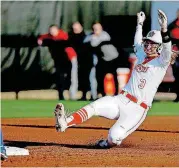  ?? [PHOTO BY BRYAN TERRY, THE OKLAHOMAN] ?? Oklahoma State’s Vanessa Shippy slides into second base during the first inning Wednesday against Tulsa in Stillwater.