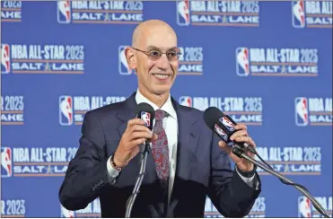  ??  ?? NBA Commission­er Adam Silver speaks during a news conference at Vivint Smart Home Arena in Salt Lake City. Something is finally clear in the uncertain NBA. Players believe they’re going to play games again this season. The obvious questions like how, where and when remain unanswered.