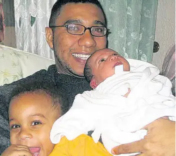  ??  ?? Prime Minister Andrew Holness and his young sons Matthew and Adam more than 10 years ago.