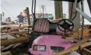  ?? Photograph: David J Phillip/AP ?? Gary Goerner surveys the damage from Hurricane Nicholas as he walks through his neighborho­od in San Luis Pass, Texas.