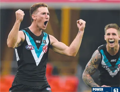  ?? Picture: GETTY IMAGES ?? HIGH PRAISE: Port Adelaide’s Kane Farrell celebrates a goal on Sunday.