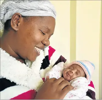  ?? Picture: EUGENE COETZEE ?? CHANGE AGENTS: Violet Lupuwana, 31, with baby Dimakatso, who is now two months old. Lupuwana has started helping other mothers of premature babies during their stay at Dora Nginza Hospital