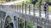  ?? PHOTO: SUPPLIED ?? Solution needed . . . Mayor Jim Boult at Queenstown’s Edith Cavell Bridge.