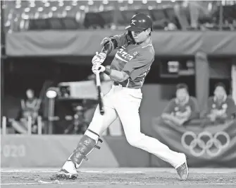  ?? YUKIHITO TAGUCHI/USA TODAY SPORTS ?? Jung Hoo Lee hits for South Korea against Japan in a baseball semifinals during the Tokyo Summer Olympic Games in 2021.