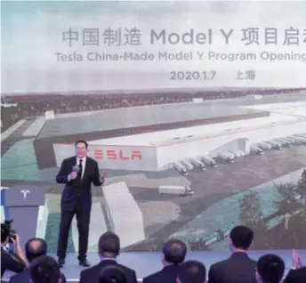  ??  ?? Tesla CEO Elon Musk announces production of the China-made Model Y in the Shanghai factory on January 7