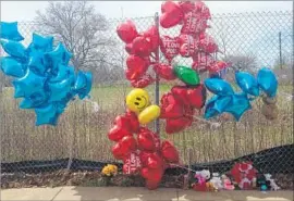  ?? Mike Householde­r Associated Press ?? A MEMORIAL in Cleveland for Robert Godwin Sr., a 74-year-old former foundry worker who was gunned down Sunday while collecting aluminum cans.