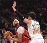  ?? AP/SETH WENIG ?? Anthony Davis of the New Orleans Pelicans scored 48 points and grabbed 17 rebounds in leading the Pelicans to a 123-118 overtime victory over the New York Knicks.