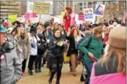  ?? MARIAN DENNIS — DIGITAL FIRST MEDIA ?? As the Women’s March on Philadelph­ia began Saturday morning, groups of women played the drums and thousands followed behind them holding signs and chanting for equality.