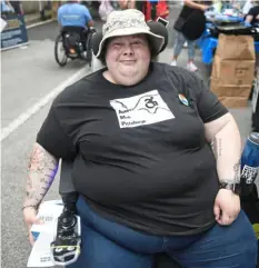  ?? Maya Giron/Post-Gazette ?? Alisa Grishman, a disability advocate and writer, at the Disability Pride Pittsburgh event on July 23, Downtown, honoring the 32nd anniversar­y of the enactment of the Americans with Disabiliti­es Act.