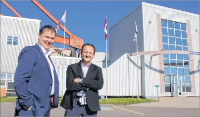  ?? COLIN MACLEAN/JOURNAL PIONEER ?? Jeff Poirier, general manager for StandardAe­ro in Summerside, left, and Peter Turner, StandardAe­ro President for Airlines & Fleets, outside the company’s Slemon Park facility.