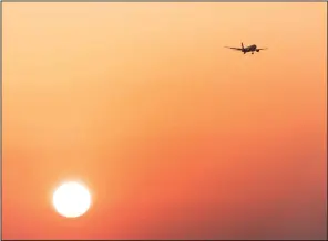  ?? (Bloomberg/Anthony Kwan) ?? A Cathay Pacific Airways aircraft prepares to land at Hong Kong Internatio­nal Airport.