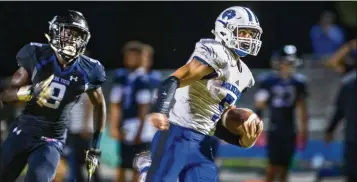  ?? GREG LOVETT / THE PALM BEACH POST ?? Wellington’s Jadien Durant takes off on a 75-yard touchdown run in the fourth quarter of Friday night’s 14-8 defeat of Park Vista. Durant also scored on a 78-yard pass play to open the game.