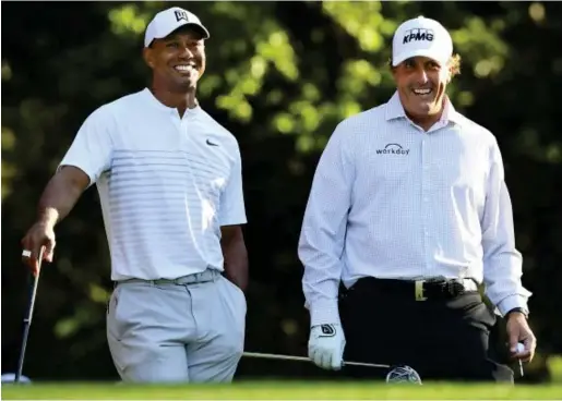  ?? Picture: NY Post ?? Tiger Woods and Phil Mickelson.