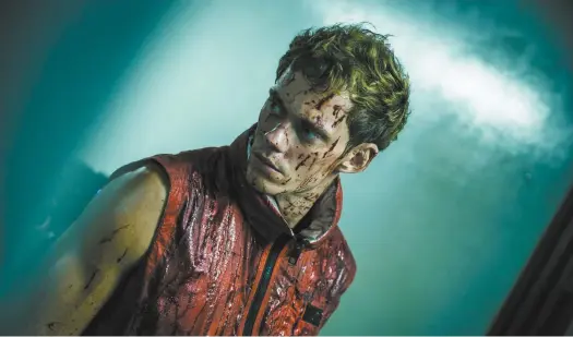  ?? ROADSIDE ATTRACTION­S ?? Bill Skarsgârd dans une scène tirée du film d’action Boy Kills World