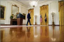  ?? ANDREW HARNIK - THE ASSOCIATED PRESS ?? President Joe Biden leaves after speaking about Russia in the East Room of the White House, Thursday, April 15, 2021, in Washington.