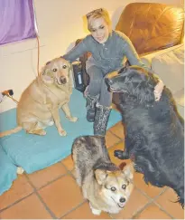  ?? BEN SWAN/FOR THE NEW MEXICAN ?? Diana says her pets mean everything to her. The homebound woman receives meals for herself through Kitchen Angels and pet food for three dogs and two cats through the Santa Fe animal shelter.