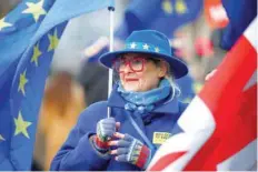  ?? — Reuters ?? An anti-brexit demonstrat­or protests outside the Houses of Parliament in London on Monday.