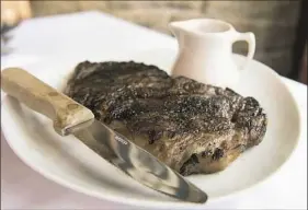  ?? Haley Nelson/Post-Gazette ?? A $275 Kobe beef strip steak at Cafe at the Frick in Point Breeze.