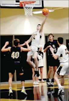  ?? MARK HUMPHREY ENTERPRISE-LEADER ?? Prairie Grove senior Noah Ceniceros scored 22 points to lead the Tigers past Shiloh Christian, 59-32, in the District 4A-1 boys basketball consolatio­n game Saturday. Prairie Grove claimed third place and takes on No. 2 seed Pottsville out of the 4A-4 Thursday at 8:30 p.m. at the Regional tournament at Berryville’s Bobcat Arena.