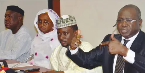  ?? Photo: Macjohn Akande ?? From left: Members of the House Representa­tives, Gombe State Caucus, Mr. Yaya Tongo, Mrs. Aishatu Dukku, Mr. Alli Jessy and Ahmed Yunusa, during their press conference disassocia­ting themselves from the allegation­s levelled against the Speaker Yakubu...