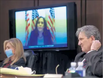  ?? POOL / GETTY IMAGES ?? Sen. John Kennedy, R-La., and Sen. Marsha Blackburn, R-Tenn., look on as Sen. Kamala Harris, D-Calif., speaks remotely during the third day of Senate Judiciary Committee confirmati­on hearings for Supreme Court nominee Judge Amy Coney Barrett.