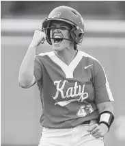  ?? Steve Gonzales / Staff photograph­er ?? Katy’s Cait Calland yells after teammate Chloe Cobb drove in a run with a single during Thursday night’s regional-clinching victory over Deer Park.