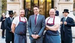  ??  ?? Hotel manager Thomas Kochs (centre) with chef Tom Kerridge (right)