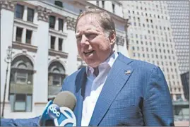  ?? KEVIN HAGEN/AP ?? Geoffrey Berman speaks with reporters Saturday. Berman agreed to step down as U.S. attorney for the Southern District of New York after saying he would stay on the job.