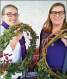  ?? Special to the Herald ?? Mother and daughter team, Erin and Jan Carlson, proudly display attractive Christmas wreaths decorated with English Ivy but encourage proper disposal of the invasive plant after the holidays.