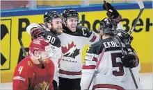  ?? LISELOTTE SABROE THE ASSOCIATED PRESS ?? Canada’s Ryan O’Reilly celebrates after scoring to lead Canada to victory against Russia in Copenhagen, Denmark, on Thursday.