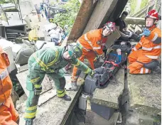  ?? ?? Emergency workers practising in last year’s SIMEX simulation