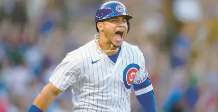  ?? ARMANDO L. SANCHEZ/CHICAGO TRIBUNE ?? Cubs catcher Willson Contreras yells after hitting a grand slam during the first inning against the Pirates on May 16 at Wrigley Field.