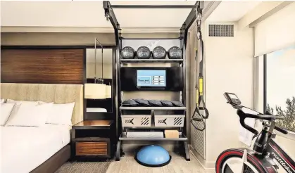  ?? HILTON HOTELS ?? Some hotels have begun to outfit rooms with fitness equipment. Far left, a hike at the Ranch, an establishe­d retreat in Malibu, Calif., that has seen an increase in bookings.