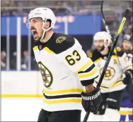  ?? Jeff Roberson / Associated Press ?? Boston Bruins left wing Brad Marchand celebrates after scoring a goal against the St. Louis Blues during the first period of Game 6 of the Stanley Cup Final on Sunday in St. Louis.