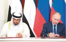  ?? WAM ?? Shaikh Mohammad and Putin sign a Declaratio­n of Strategic Partnershi­p at the Kremlin.