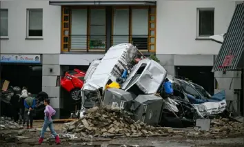  ?? Sascha Schuermann/Getty Images ?? Streets and residences damaged by the flooding of the Ahr River are seen on Friday in Bad Neuenahr-Ahrweiler, Germany.