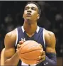  ?? Lance King / Getty Images ?? Yale’s Miye Oni focuses at the free-throw line.