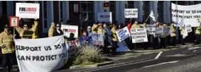  ?? ?? Raising awareness yesterday. . . . Firefighte­rs strike in Central Dunedin