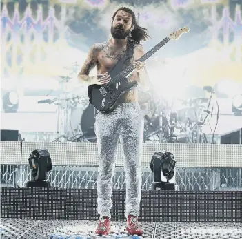  ?? (photo: Andy Buchanan/AFP via Getty Images) Left in circle Sam Smith (photo: Kevin Winter/Getty Images for Coachella) ?? Scots rockers Biffy Clyro