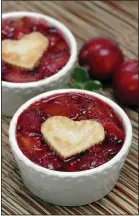  ?? PHOTO BY NICK KOON ?? Plum or plumcot Bleeding Heart “Pies” are made with plum filling that is baked separately from the heart-shaped crust atop.