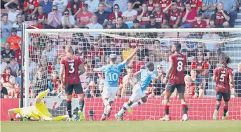  ?? — Reuters photo ?? Manchester City’s Raheem Sterling celebrates scoring their second goal.