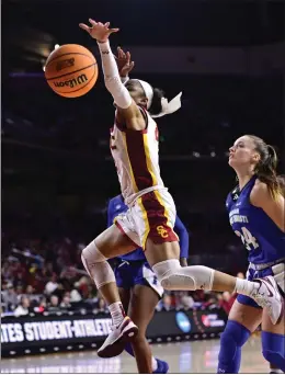  ?? KEITH BIRMINGHAM — STAFF PHOTOGRAPH­ER ?? Kayla Williams of USC loses control of the ball on the way to the basket during Saturday’s NCAA Tournament first-round win against Texas A&M-Corpus Cristi at Galen Center.