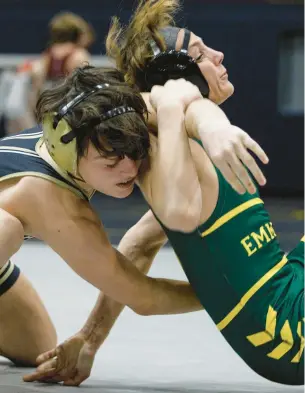  ?? JANE THERESE/SPECIAL TO THE MORNING CALL ?? Bethlehem Catholic freshman Reef Dillard, left, won his first District 11 Class 3A championsh­ip Saturday at Liberty’s Memorial Gym.