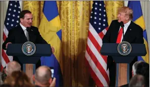  ?? AP/EVAN VUCCI ?? At a news conference Tuesday at the White House with Swedish Prime Minister Stefan Lofven, President Donald Trump said he wasn’t worried about Russian meddling in the U.S. midterm elections. “Whatever they do, we’ll counteract it very strongly,” he said.