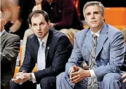  ??  ?? Oral Roberts coach Scott Sutton, right, and assistant Sean Sutton watch a game from the bench as the Golden Eagles take on Texas-San Antonio at Gallagher-Iba Arena in StillTexas