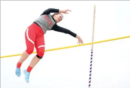  ?? COLEEN MOSKOWITZ — THE NEWS-HERALD ?? Geneva’s Bri Aveni clears 10 feet during girls pole vault April 14 at the Perry Relays. The Eagles won the A division team title with 122 points.