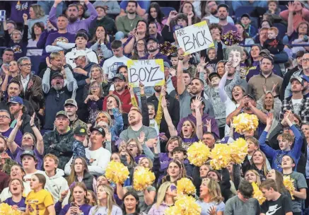  ?? MATT STONE/THE COURIER JOURNAL ?? The Lyon County fan section cheers the Lyons’ boys basketball team during the Sweet 16 championsh­ip game on Saturday against Harlan County at Rupp Arena in Lexington.