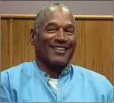  ?? Lovelock Correction­al Center/Pool photo ?? Former NFL football star O.J. Simpson appears for his parole hearing at the Lovelock Correction­al Center in Lovelock, Nev., on Thursday. Simpson was convicted in 2008 of enlisting some men he barely knew, including two who had guns, to retrieve from...