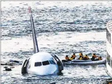  ?? BEBETO MATTHEWS AP FILE ?? Passengers in an inflatable raft move away from US Airways Flight 1549 that went down on Jan. 15, 2009, in the Hudson River in New York.