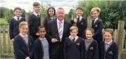  ??  ?? Paul Loughran, headteache­r at St Michael’s Catholic Primary School in Widnes has won the Primary Headteache­r Of The Year Award from the Archdioces­e Of Liverpool